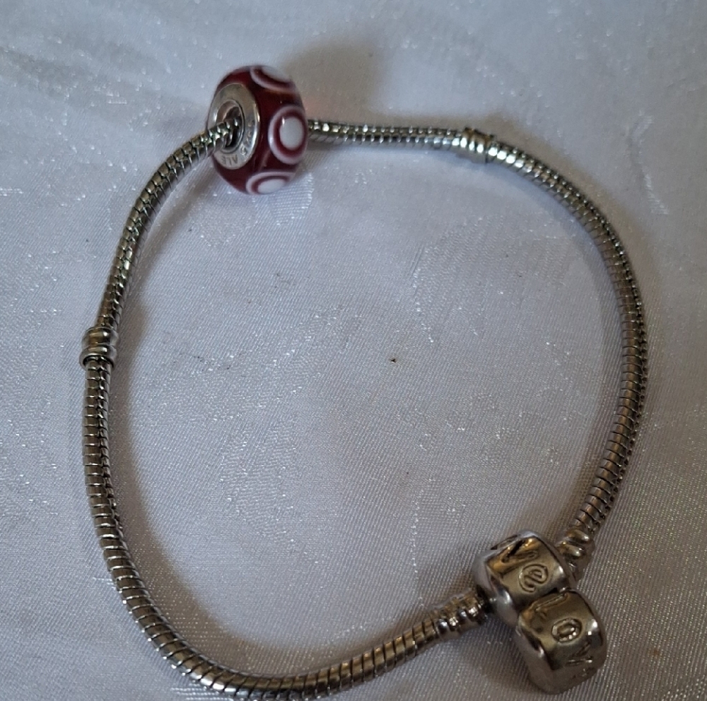 Elegant Silver Bracelet with Red Bead